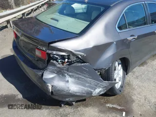 2009 Acura TSX with VIN JH4CU26659C027813, listed as a IAAI auction lot 41848415 with 216,257 mi miles. Bid and sale history available at carsss.com. Image 6.