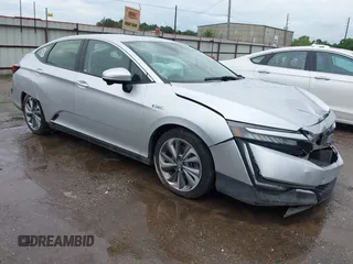 2018 Honda Clarity Touring z VIN JHMZC5F33JC005415, wystawiony jako IAAI lot #42482136 z przebiegiem 83 869 mil mil oraz . Historia ofert i sprzedaży dostępna na DreamBid. Obrazek 1.