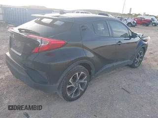 2018 Toyota C-HR XLE with VIN JTNKHMBX6J1007058, listed as a IAAI auction lot 42100587 with 71,725 mi miles and . Bid and sale history available at DreamBid. Image 4.