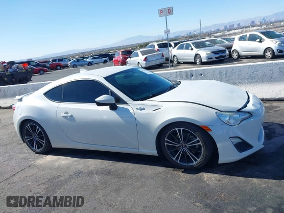 2015 Scion FR-S with VIN JF1ZNAA12F9709707, listed as a IAAI auction lot 41545940 with 107,575 mi miles. Bid and sale history available at carsss.com. Image 13.
