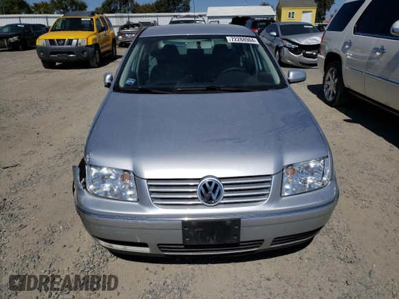 2004 Volkswagen Jetta GL z VIN 3VWRA69M54M007376, wystawiony jako Copart lot #72288984 z przebiegiem 91 687 mil mil oraz Szkoda całkowita • Salvage title. Historia ofert i sprzedaży dostępna na DreamBid. Obrazek 5.