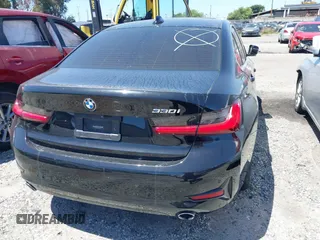 2021 BMW 3 Series 330i with VIN 3MW5R1J09M8C21377, listed as a IAAI auction lot 41892259 with Not Provided miles and . Bid and sale history available at carsss.com. Image 16.