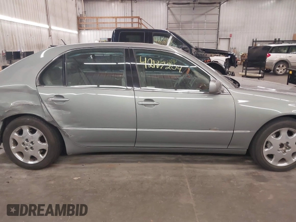 2001 Lexus LS 430 z VIN JTHBN30F510019661, wystawiony jako IAAI lot #42167204 z przebiegiem 190 437 mil mil oraz . Historia ofert i sprzedaży dostępna na DreamBid. Obrazek 14.