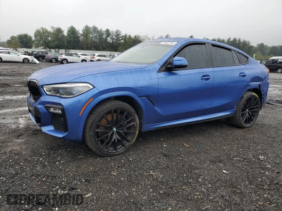2020 BMW X6 M50i with VIN 5UXCY8C07L9B45473, listed as a Copart auction lot 73403164 with 0 mi miles and Salvage Title. Bid and sale history available at carsss.com. Image 1.