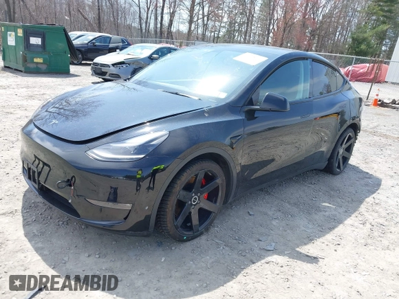 2022 Tesla Model Y Performance with VIN 7SAYGDEF7NF310113, listed as a IAAI auction lot 42038407 with 46,052 mi miles and . Bid and sale history available at DreamBid. Image 2.