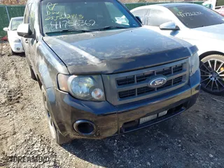 2009 Ford Escape XLT with VIN 1FMCU93G59KB55025, listed as a IAAI auction lot 41756362 with 999,999 mi miles. Bid and sale history available at carsss.com. Image 6.