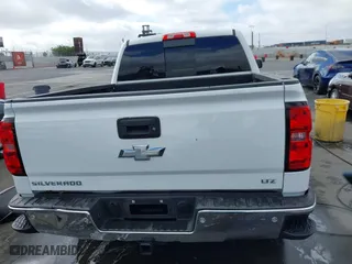 2015 Chevrolet Silverado 1500 LTZ with VIN 3GCUKSEC8FG164515, listed as a IAAI auction lot 40711690 with 91,440 mi miles. Bid and sale history available at carsss.com. Image 16.