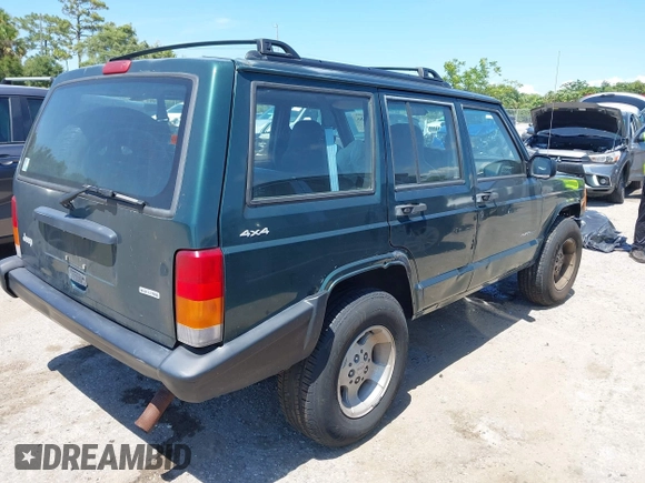 2000 Jeep Cherokee SE with VIN 1J4FF28S0YL236369, listed as a IAAI auction lot 42314386 with 159,005 mi miles and . Bid and sale history available at DreamBid. Image 4.