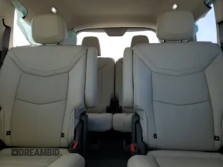 2021 Cadillac XT6 Premium Luxury z VIN 1GYKPCRS6MZ205831, wystawiony jako Copart lot #47259215 z przebiegiem 31 959 mil mil oraz Szkody całkowita. Historia ofert i sprzedaży dostępna na DreamBid. Obrazek 10.