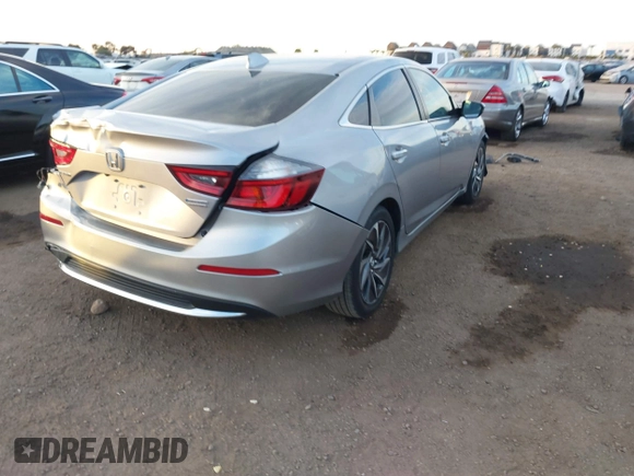 2021 Honda Insight Touring with VIN 19XZE4F99ME009749, listed as a IAAI auction lot 41411868 with 54,808 mi miles and . Bid and sale history available at carsss.com. Image 4.