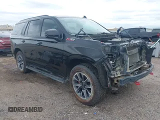 2021 Chevrolet Tahoe Z71 with VIN 1GNSKPKD6MR113116, listed as a IAAI auction lot 42304252 with 128,199 mi miles and . Bid and sale history available at DreamBid. Image 1.