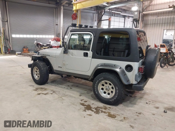 2003 Jeep Wrangler Rubicon with VIN 1J4FA69S13P375142, listed as a IAAI auction lot 41709647 with 125,443 mi miles and . Bid and sale history available at DreamBid. Image 3.