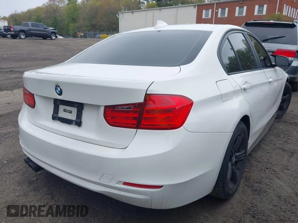 2014 BMW 3 Series 328i xDrive with VIN WBA3B5C56EP544400, listed as a IAAI auction lot 42172100 with 242,472 mi miles. Bid and sale history available at carsss.com. Image 4.