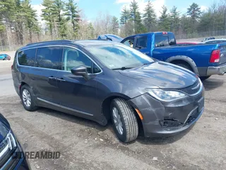 2017 Chrysler Pacifica Touring L with VIN 2C4RC1BGXHR667397, listed as a IAAI auction lot 42085117 with 63,996 mi miles and . Bid and sale history available at DreamBid. Image 13.