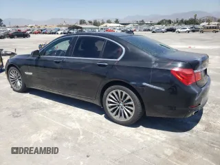2012 BMW 7 Series 740i with VIN WBAKA4C59CDS99342, listed as a Copart auction lot 63705894 with 0 mi miles and Salvage Title. Bid and sale history available at carsss.com. Image 2.