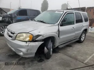 2005 Mazda Tribute LX with VIN 4F2CZ94145KM33391, listed as a Copart auction lot 77809864 with Not Provided miles and Salvage Title. Bid and sale history available at carsss.com. Image 1.