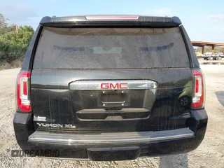 2019 GMC Yukon XL Denali with VIN 1GKS2HKJ2KR226275, listed as a IAAI auction lot 41552828 with 82,069 mi miles. Bid and sale history available at carsss.com. Image 17.