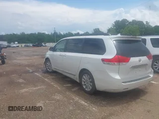 2014 Toyota Sienna XLE with VIN 5TDYK3DC2ES517663, listed as a IAAI auction lot 42171862 with 143,447 mi miles and . Bid and sale history available at DreamBid. Image 3.