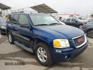 2004 GMC Envoy SLT with VIN 1GKDS13S342283765, listed as a IAAI auction lot 42054969 with 193,080 mi miles. Bid and sale history available at carsss.com. Image 1.
