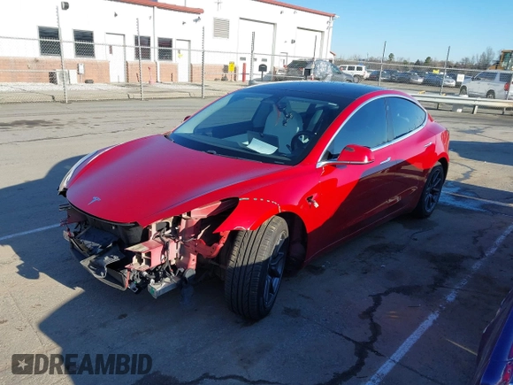 2020 Tesla Model 3 Long Range with VIN 5YJ3E1EB4LF668470, listed as a IAAI auction lot 41743651 with 151,957 mi miles. Bid and sale history available at carsss.com. Image 2.