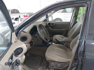 2004 Hyundai Santa Fe GLS with VIN KM8SC73D04U846243, listed as a IAAI auction lot 42126245 with 153,229 mi miles. Bid and sale history available at carsss.com. Image 5.