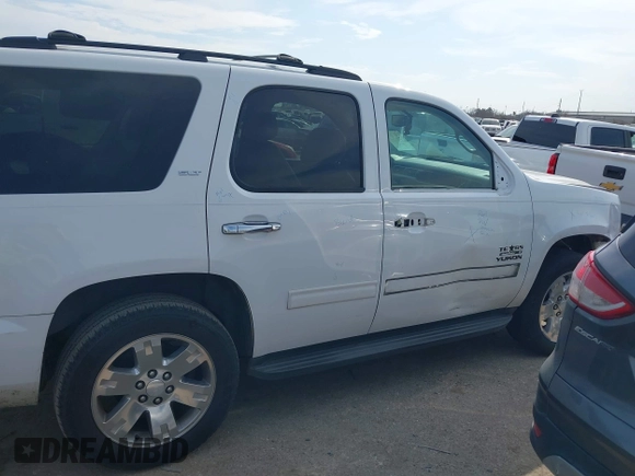 2011 GMC Yukon SLT with VIN 1GKS1CE03BR347941, listed as a IAAI auction lot 41637343 with 198,830 mi miles. Bid and sale history available at carsss.com. Image 14.
