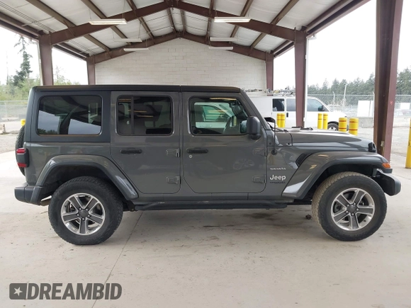 2019 Jeep Wrangler Unlimited Sahara with VIN 1C4HJXEN0KW540591, listed as a IAAI auction lot 42076235 with 41,016 mi miles and . Bid and sale history available at DreamBid. Image 14.