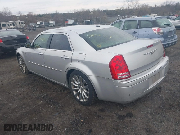 2009 Chrysler 300 with VIN 2C3LA63T89H622085, listed as a IAAI auction lot 41872519 with 151,543 mi miles. Bid and sale history available at carsss.com. Image 3.