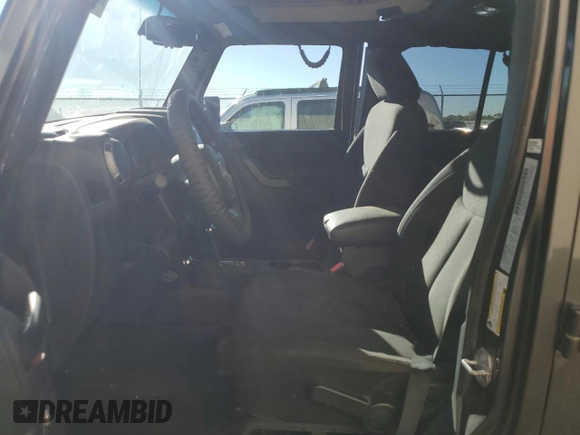 2016 Jeep Wrangler Unlimited Sport with VIN 1C4BJWDG4GL210206, listed as a Copart auction lot 80988164 with 101,544 mi miles and Salvage Title. Bid and sale history available at DreamBid. Image 7.