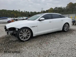 2013 Jaguar XJ with VIN SAJWA2GB8DLV52975, listed as a Copart auction lot 79123644 with 160,473 mi miles and Salvage Title. Bid and sale history available at carsss.com. Image 1.