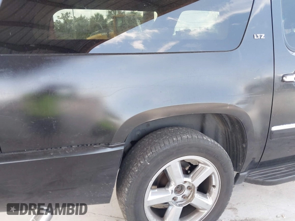 2011 Chevrolet Suburban LTZ with VIN 1GNSKKE3XBR180241, listed as a IAAI auction lot 42365771 with 231,477 mi miles and . Bid and sale history available at DreamBid. Image 17.