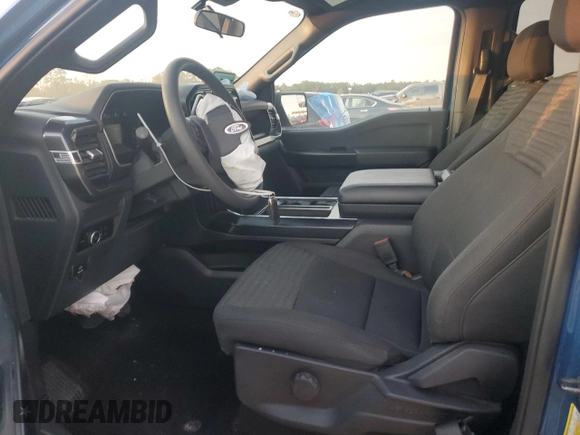 2023 Ford F-150 XL with VIN 1FTFW1E51PKF30933, listed as a Copart auction lot 82439694 with 26,267 mi miles and Salvage Title. Bid and sale history available at carsss.com. Image 7.