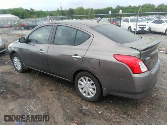 2015 Nissan Versa SV with VIN 3N1CN7AP7FL869485, listed as a IAAI auction lot 42077524 with 198,646 mi miles. Bid and sale history available at carsss.com. Image 3.