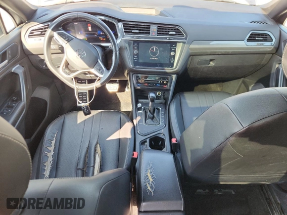 2023 Volkswagen Tiguan SE R-Line Black with VIN 3VVCB7AX3PM056471, listed as a Copart auction lot 60679225 with 94,752 mi miles and Clean title. Bid and sale history available at DreamBid. Image 8.
