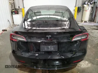 2023 Tesla Model 3 with VIN 5YJ3E1EA8PF451324, listed as a Copart auction lot 88318475 with 74,582 mi miles and Salvage Title. Bid and sale history available at DreamBid. Image 6.