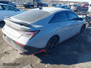 2025 Hyundai Elantra N with VIN KMHLW4DK9SU023797, listed as a IAAI auction lot 41433306 with 2,019 mi miles. Bid and sale history available at carsss.com. Image 4.