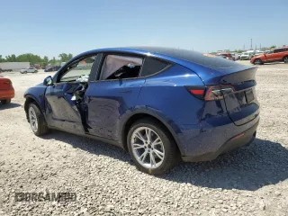 2024 Tesla Model Y Long Range with VIN 7SAYGDEEXRA286528, listed as a Copart auction lot 56321585 with Not provided miles and Salvage title. Bid and sale history available at DreamBid. Image 2.