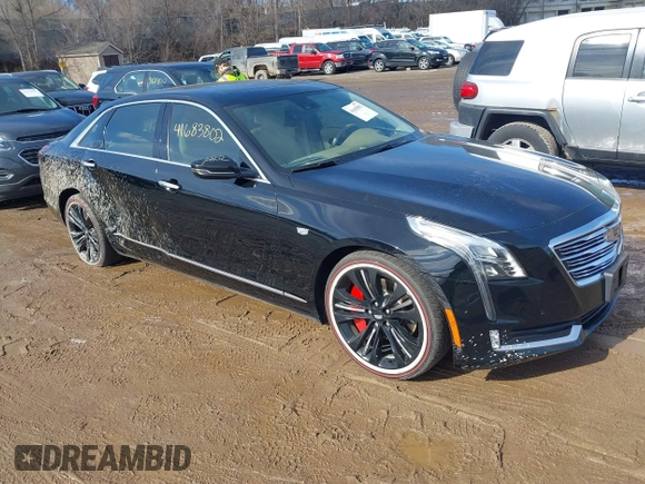 2017 Cadillac CT6 Platinum AWD z VIN 1G6KN5R64HU175275, wystawiony jako IAAI lot #41683802 z przebiegiem 75 604 mil mil oraz . Historia ofert i sprzedaży dostępna na DreamBid. Obrazek 1.