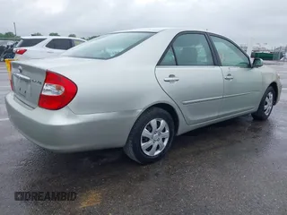 2002 Toyota Camry LE z VIN JTDBE32K220022434, wystawiony jako IAAI lot #42194752 z przebiegiem 168 955 mil mil oraz . Historia ofert i sprzedaży dostępna na DreamBid. Obrazek 4.