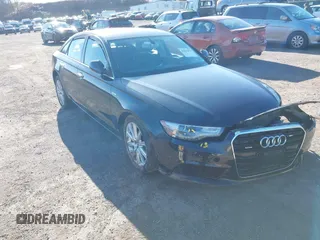 2014 Audi A6 Premium Plus z VIN WAUFGAFC5EN133941, wystawiony jako IAAI lot #41835479 z przebiegiem 68 911 mil mil oraz . Historia ofert i sprzedaży dostępna na DreamBid. Obrazek 1.