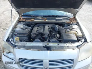 2007 Dodge Magnum z VIN 2D4FV47VX7H899799, wystawiony jako IAAI lot #42368907 z przebiegiem 209 558 mil mil oraz . Historia ofert i sprzedaży dostępna na DreamBid. Obrazek 10.