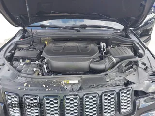 2021 Jeep Grand Cherokee Laredo X with VIN 1C4RJFAG2MC516111, listed as a IAAI auction lot 42222439 with 60,888 mi miles and . Bid and sale history available at DreamBid. Image 10.