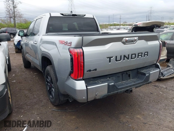 2022 Toyota Tundra Limited Hybrid with VIN 5TFJC5DB8NX009385, listed as a IAAI auction lot 41952224 with 40,497 mi miles and . Bid and sale history available at DreamBid. Image 3.