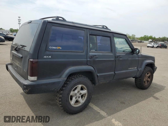 1999 Jeep Cherokee Sport with VIN 1J4FF68S9XL635836, listed as a Copart auction lot 59573195 with 187,035 mi miles and Salvage title. Bid and sale history available at DreamBid. Image 3.