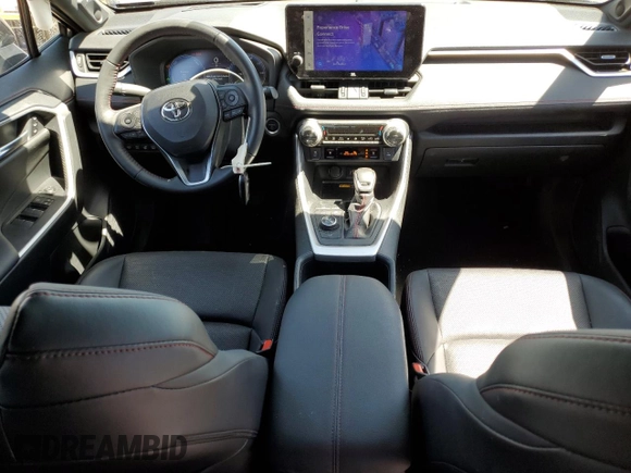 2024 Toyota RAV4 XSE with VIN JTMFB3FV7RD185694, listed as a Copart auction lot 57692835 with 11,900 mi miles and Salvage title. Bid and sale history available at DreamBid. Image 8.