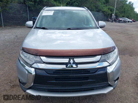 2016 Mitsubishi Outlander SE with VIN JA4AD3A34GZ005690, listed as a IAAI auction lot 42547477 with 79,040 mi miles and . Bid and sale history available at DreamBid. Image 13.