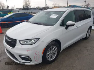 2023 Chrysler Pacifica Touring L with VIN 2C4RC1BG6PR520945, listed as a IAAI auction lot 41591128 with 70,351 mi miles and . Bid and sale history available at DreamBid. Image 19.