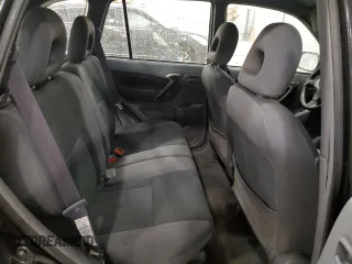 2003 Toyota RAV4 z VIN JTEHH20V836080549, wystawiony jako Copart lot #57141275 z przebiegiem 169 110 mil mil oraz Szkoda całkowita • Salvage title. Historia ofert i sprzedaży dostępna na DreamBid. Obrazek 11.