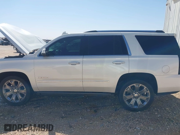 2015 GMC Yukon Denali with VIN 1GKS2CKJ3FR568729, listed as a IAAI auction lot 41741987 with 154,729 mi miles. Bid and sale history available at carsss.com. Image 14.