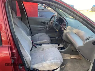 1999 Ford Contour SE Fleet z VIN 1FAFP66L2XK149217, wystawiony jako Copart lot #79546104 z przebiegiem 231 245 mil mil oraz Tytuł czysty. Historia ofert i sprzedaży dostępna na DreamBid. Obrazek 5.